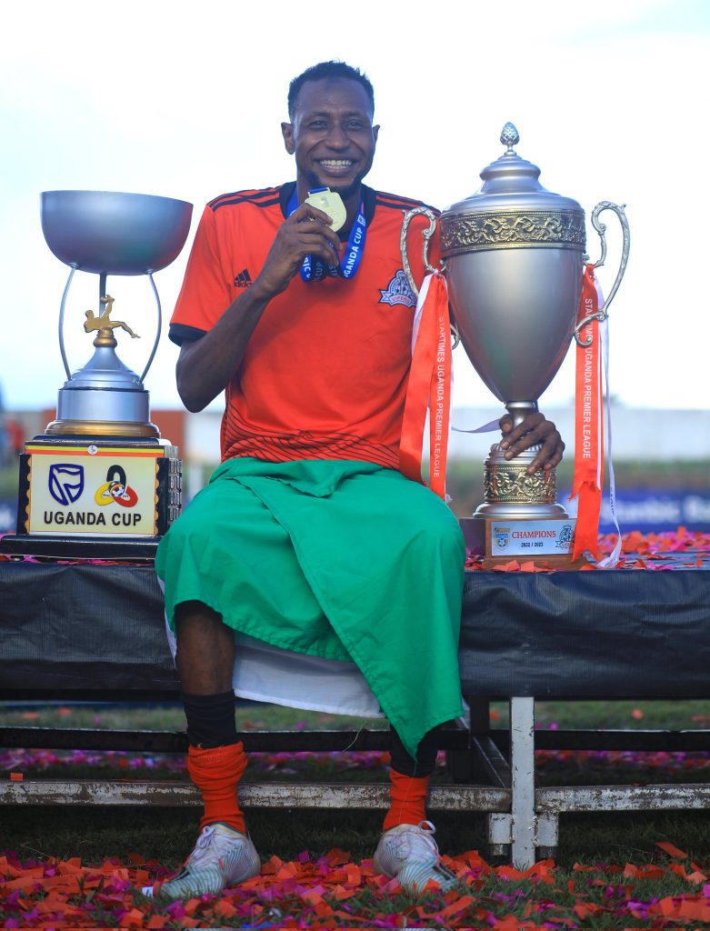 Abubakar Lawal celebrating after his club Vipers clinched the double 